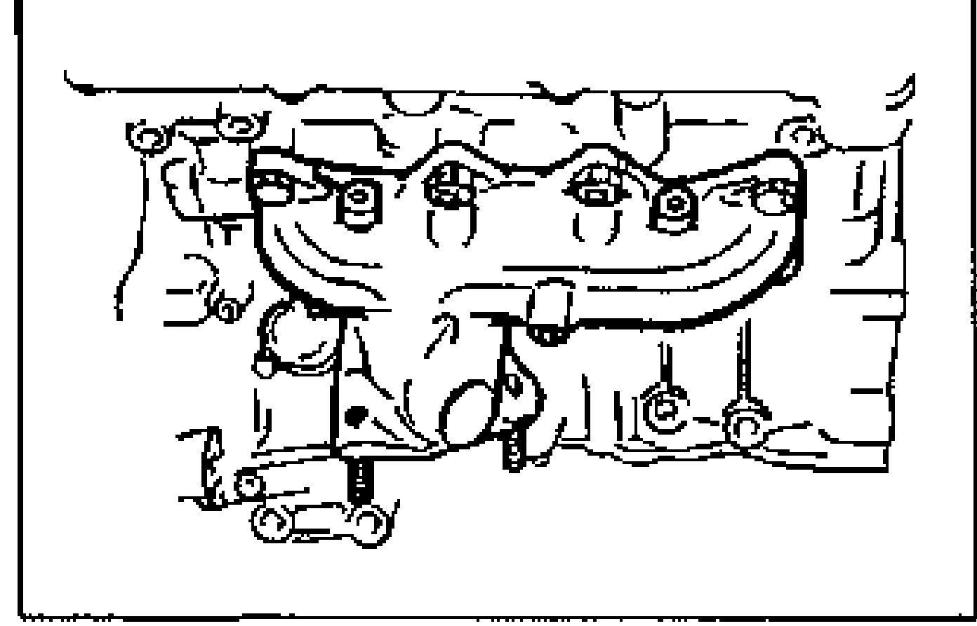 Photo of the right exhaust manifold removed together with the gasket, EGR valve and pipe.