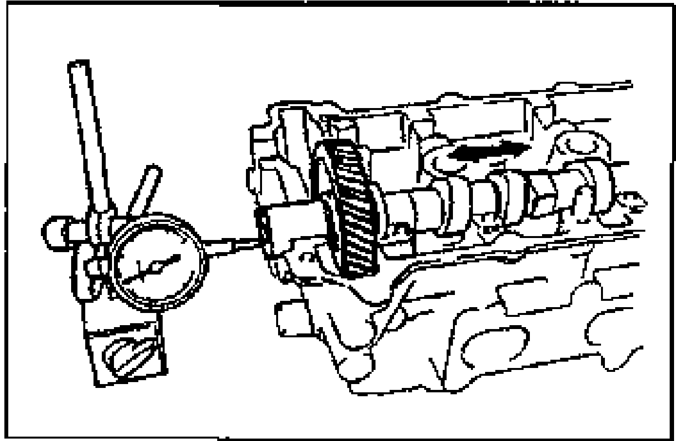 Dial indicator set against the camshaft to measure camshaft end play; an arrow shows the axial direction of measurement.