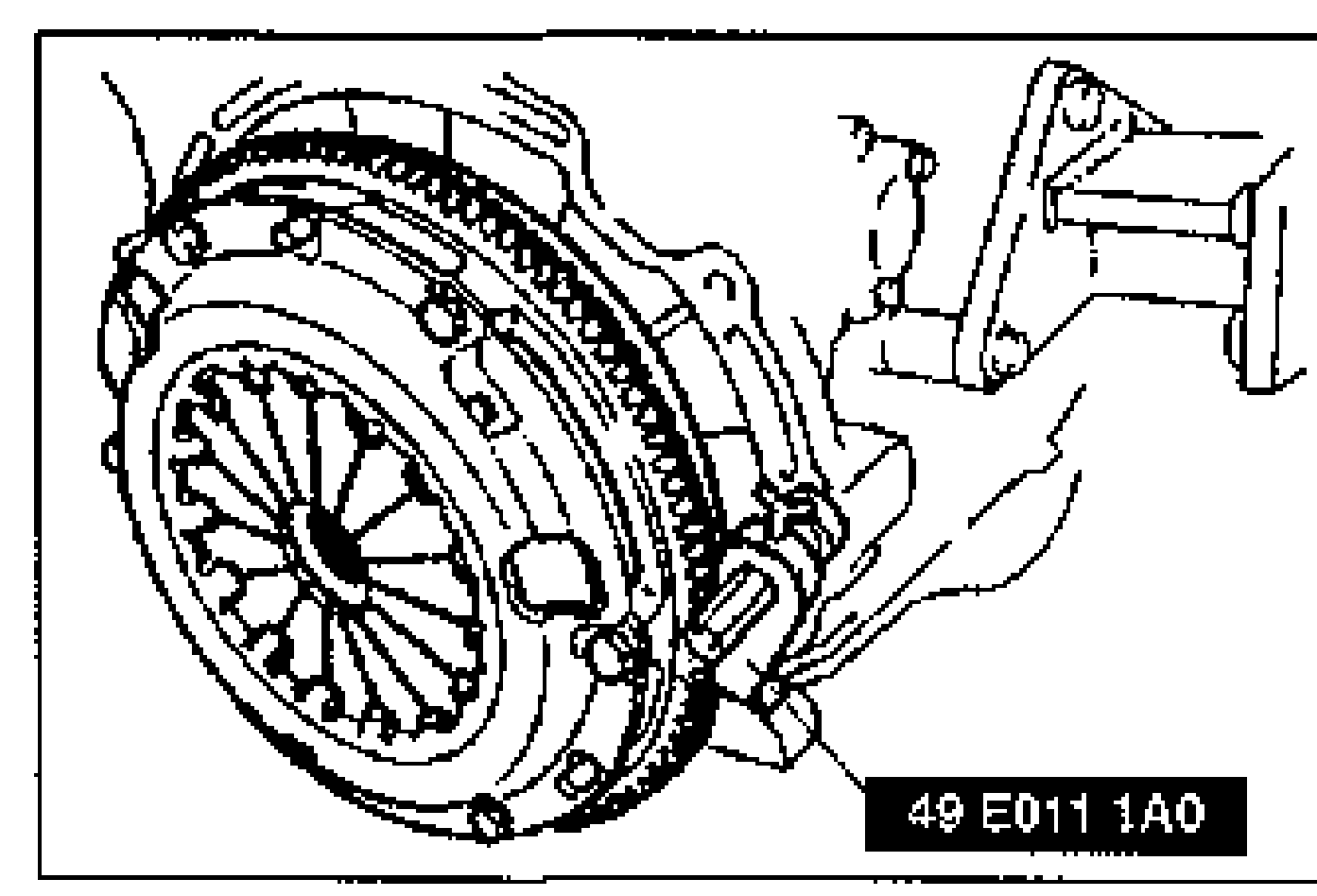 Clutch cover/disc assembly held by the SST (49 E011 1A0) while removing the clutch cover bolts.