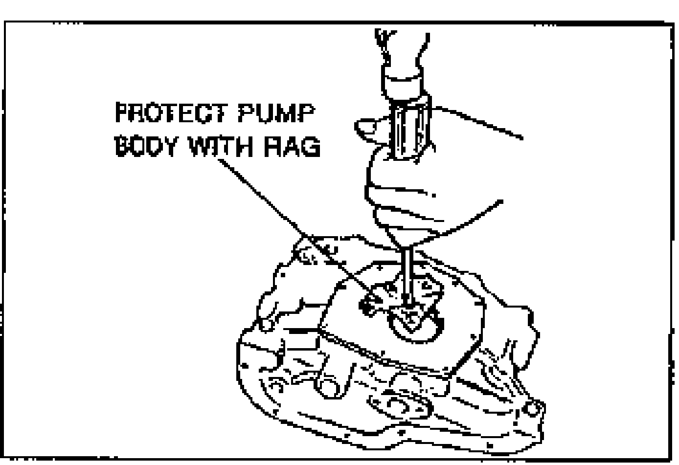 Drawing of removing the front oil seal from the oil pump body using a screwdriver wrapped with a rag. Note reads PROTECT PUMP BODY WITH RAG.