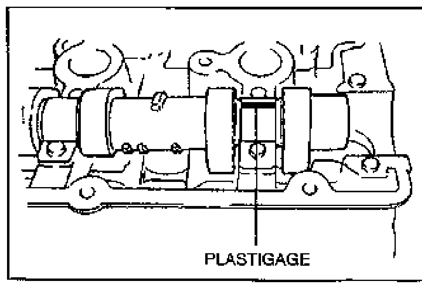 Line drawing of the camshaft installed on the cylinder head with a strip of Plastigage placed atop a journal in the axial direction; labelled PLASTIGAGE.