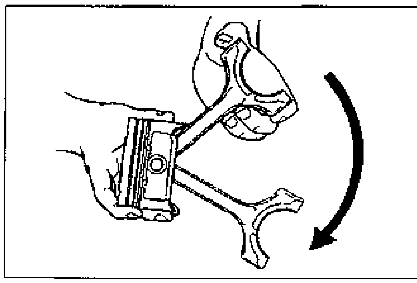 Hands rotating the connecting rod on the assembled piston to check oscillation torque; curved arrow shows swing direction.