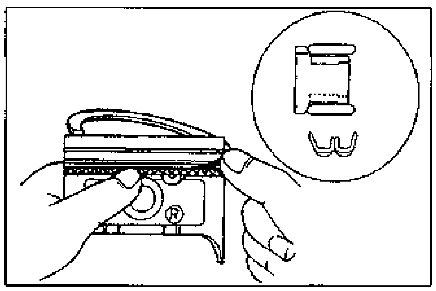 Installing three-piece oil ring on the piston by hand; inset (circle) detail shows oil ring spacer and rail cross-section.