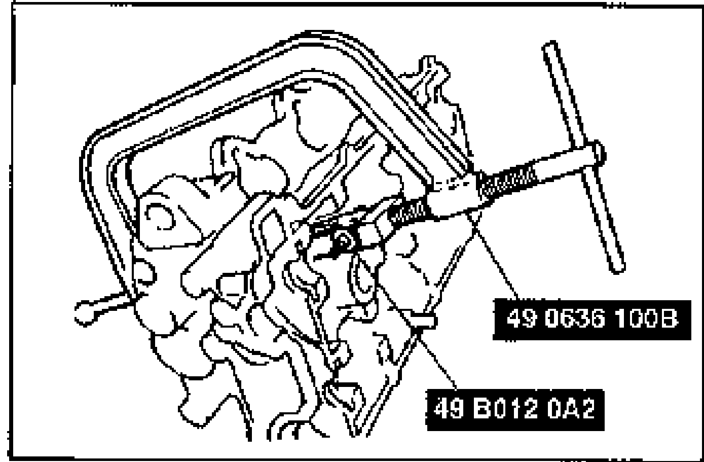 Compressing the valve spring with SST valve-spring compressor 49 0636 100B and adapter 49 B012 0A2 to install the valve keepers.