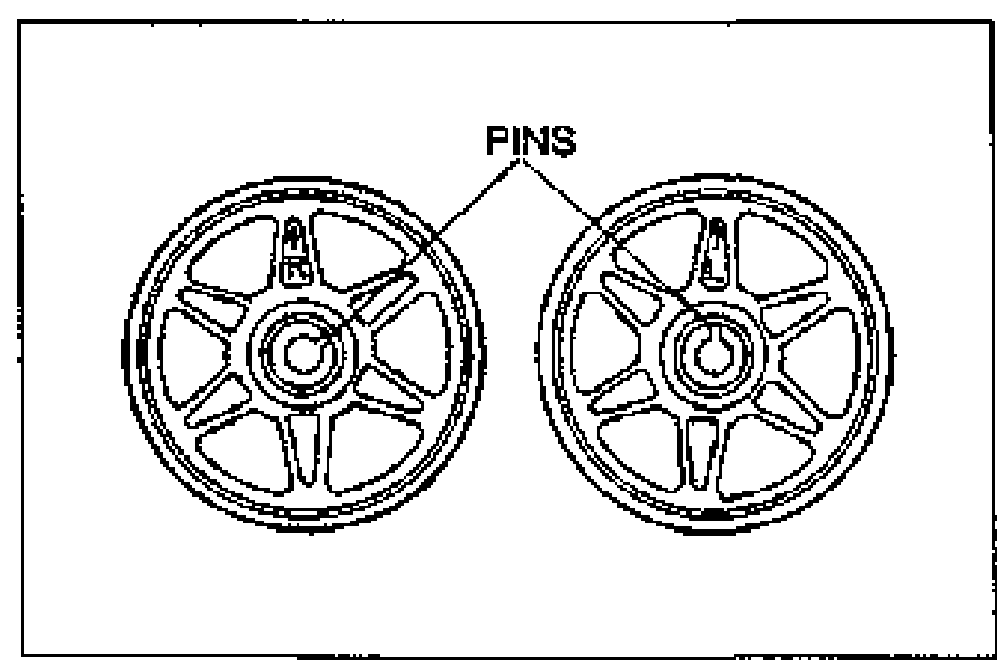 Right and left camshaft pulleys shown side by side. A PINS callout points to the knock-pin holes that differ between the two pulleys, illustrating they are not interchangeable.