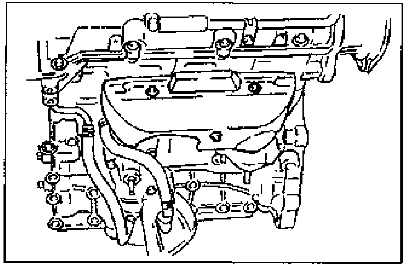 Left (LH) exhaust manifold insulator (heat shield) being installed over the exhaust manifold.