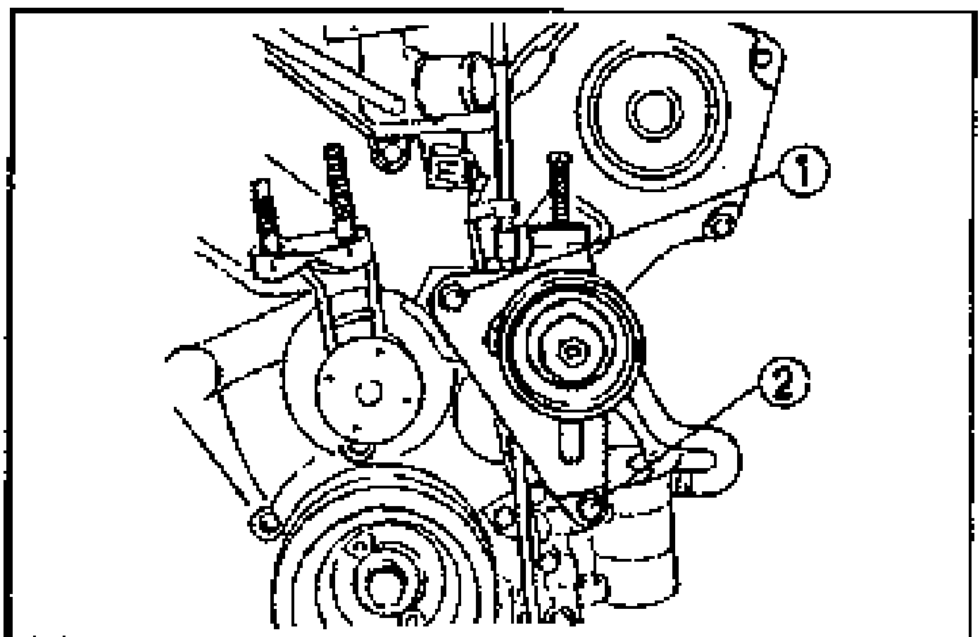 Bracket and tensioner installed on the engine front. Numbered callouts (1) and (2) indicate the two bolts and their tightening sequence.