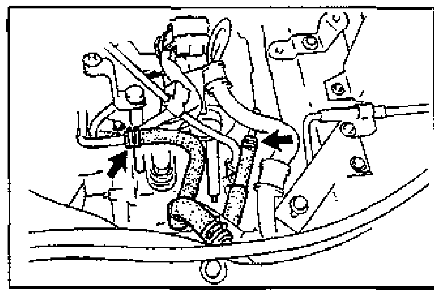 Oil cooler hose (ATX) connections near the transaxle; arrows point to the two oil cooler hose connections.