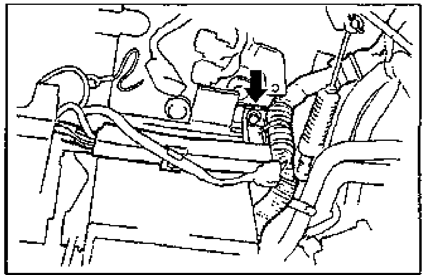 Engine harness being installed to the battery carrier; an arrow points to the harness attachment location.
