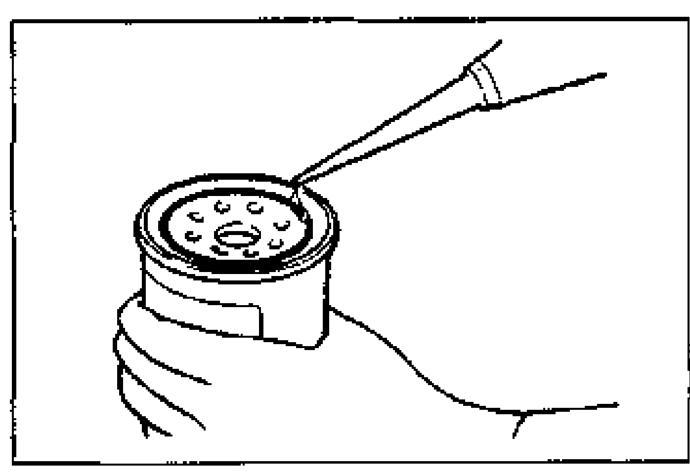 Illustration of applying clean engine oil to the O-ring of a new oil filter with a finger/brush. Illustrates lubricating the new filter O-ring.