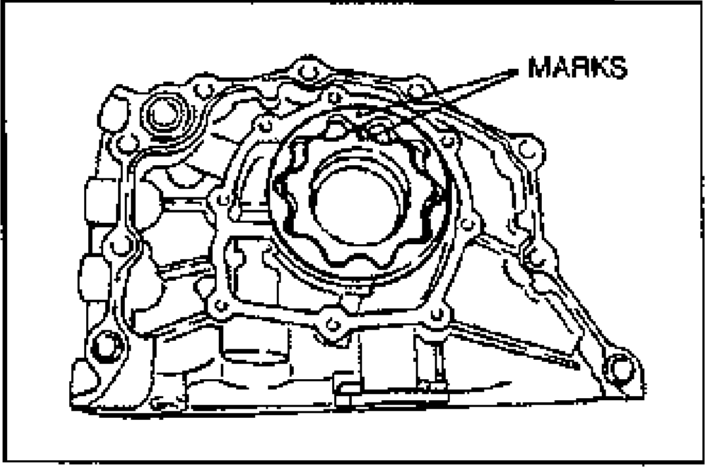Inner and outer rotors installed in the oil pump body with the alignment marks aligned; a leader line labelled 'MARKS' points to the rotor face marks.