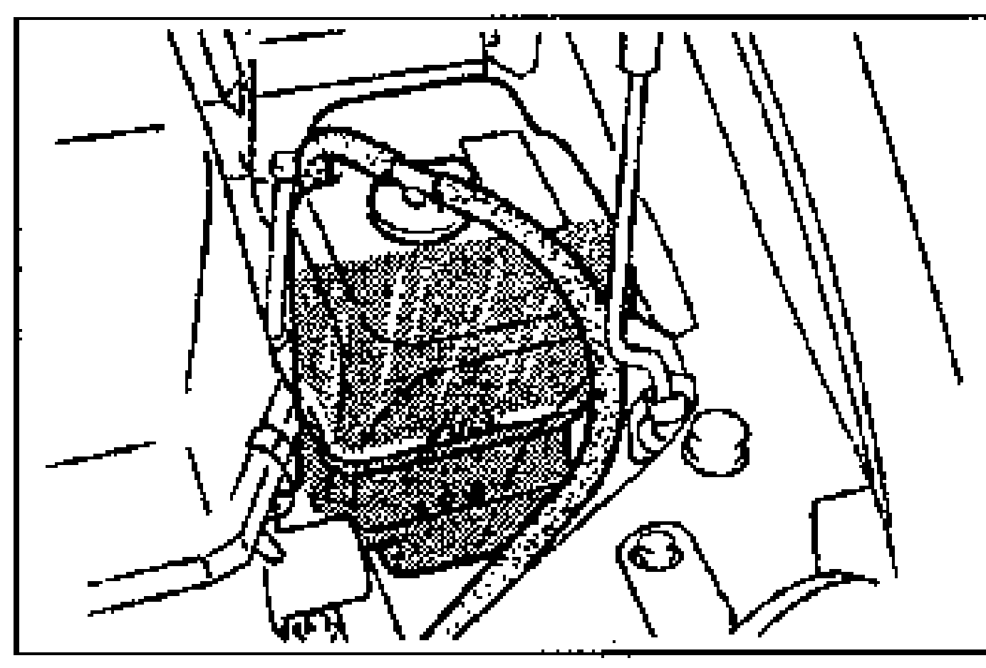 Engine-bay view showing the radiator filler neck/cap area for checking coolant level when the engine is cold.
