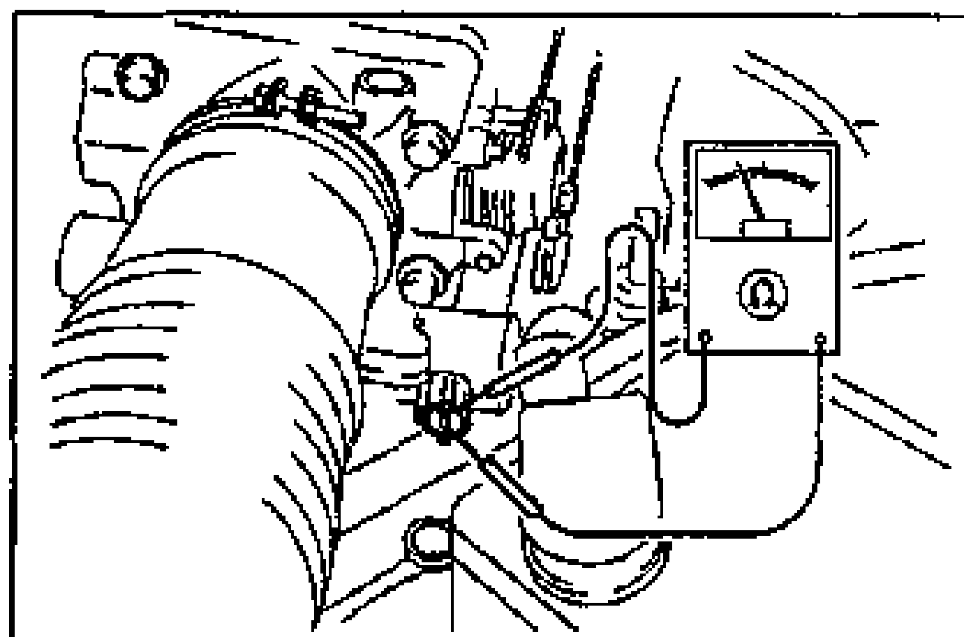 Idle air control valve resistance measurement: ohmmeter probes applied to the disconnected idle air control valve connector terminals.