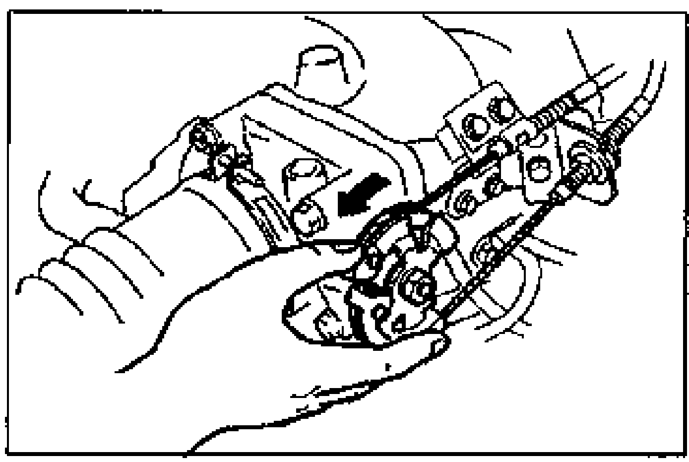 Close-up of a hand connecting a tachometer / checking vacuum at the throttle area with an arrow indicating the connection point.