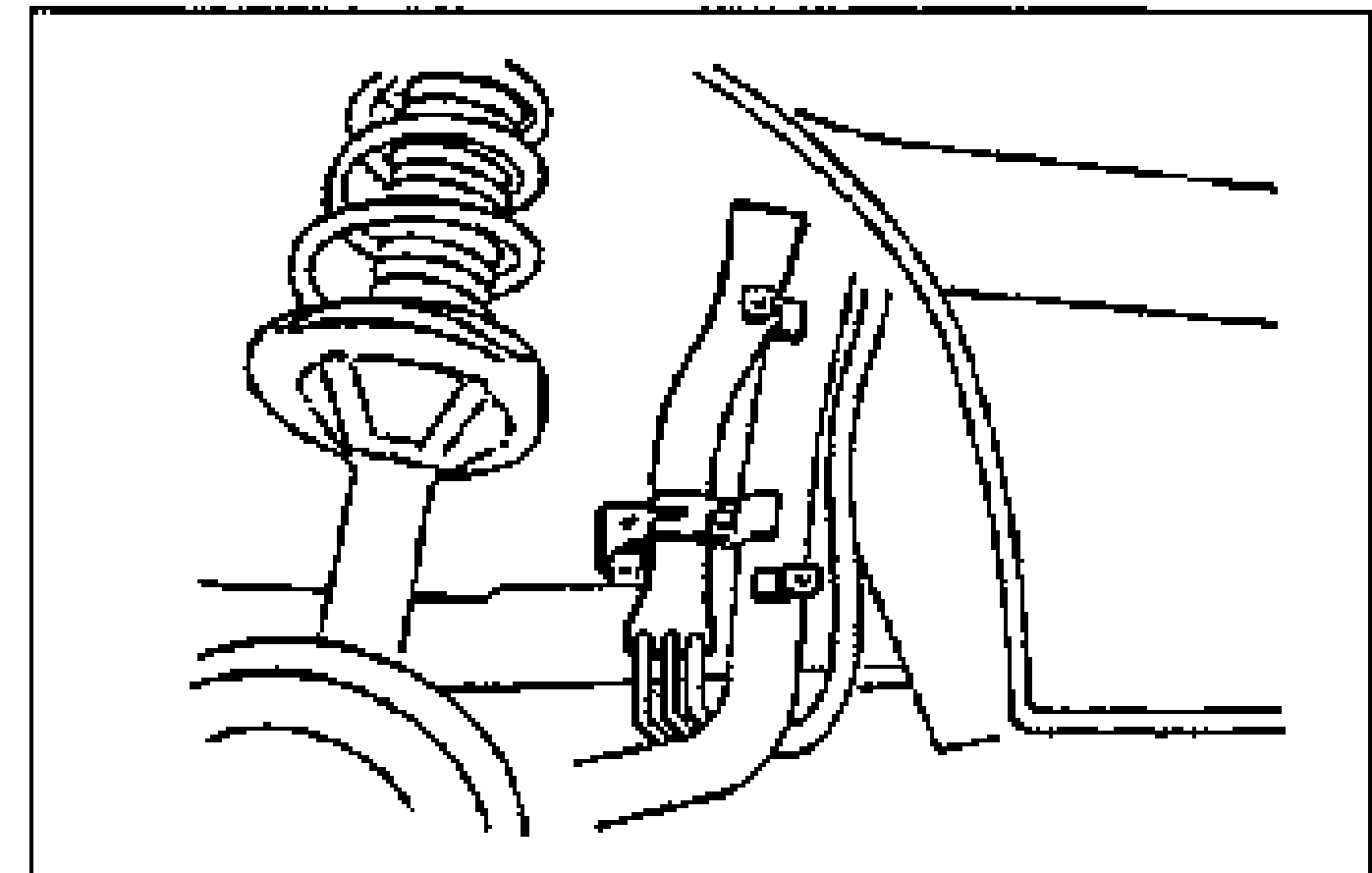 Interior view showing the separator location behind the left side trim, near the suspension tower / coil spring.