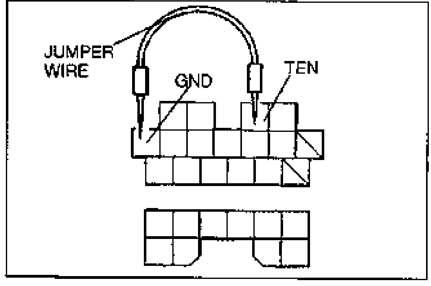 Data link connector with a jumper wire bridging the GND and TEN terminals.