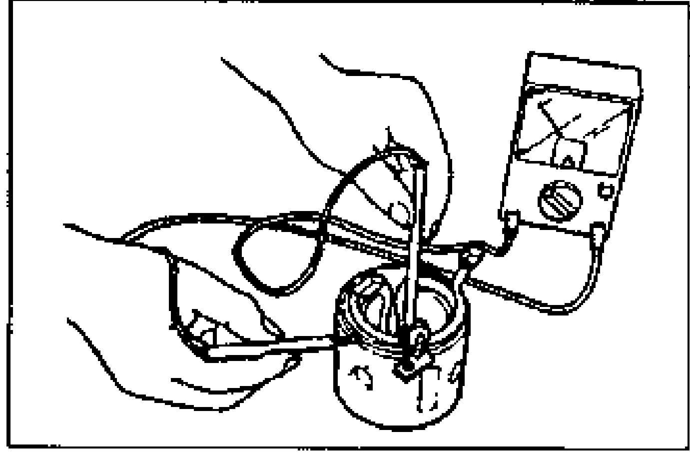 Hand using an ohmmeter to check continuity between the terminal M wire and the yoke.