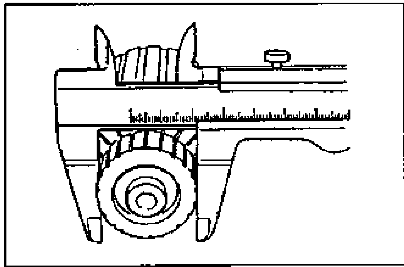 Vernier caliper measuring the outer diameter of the commutator.