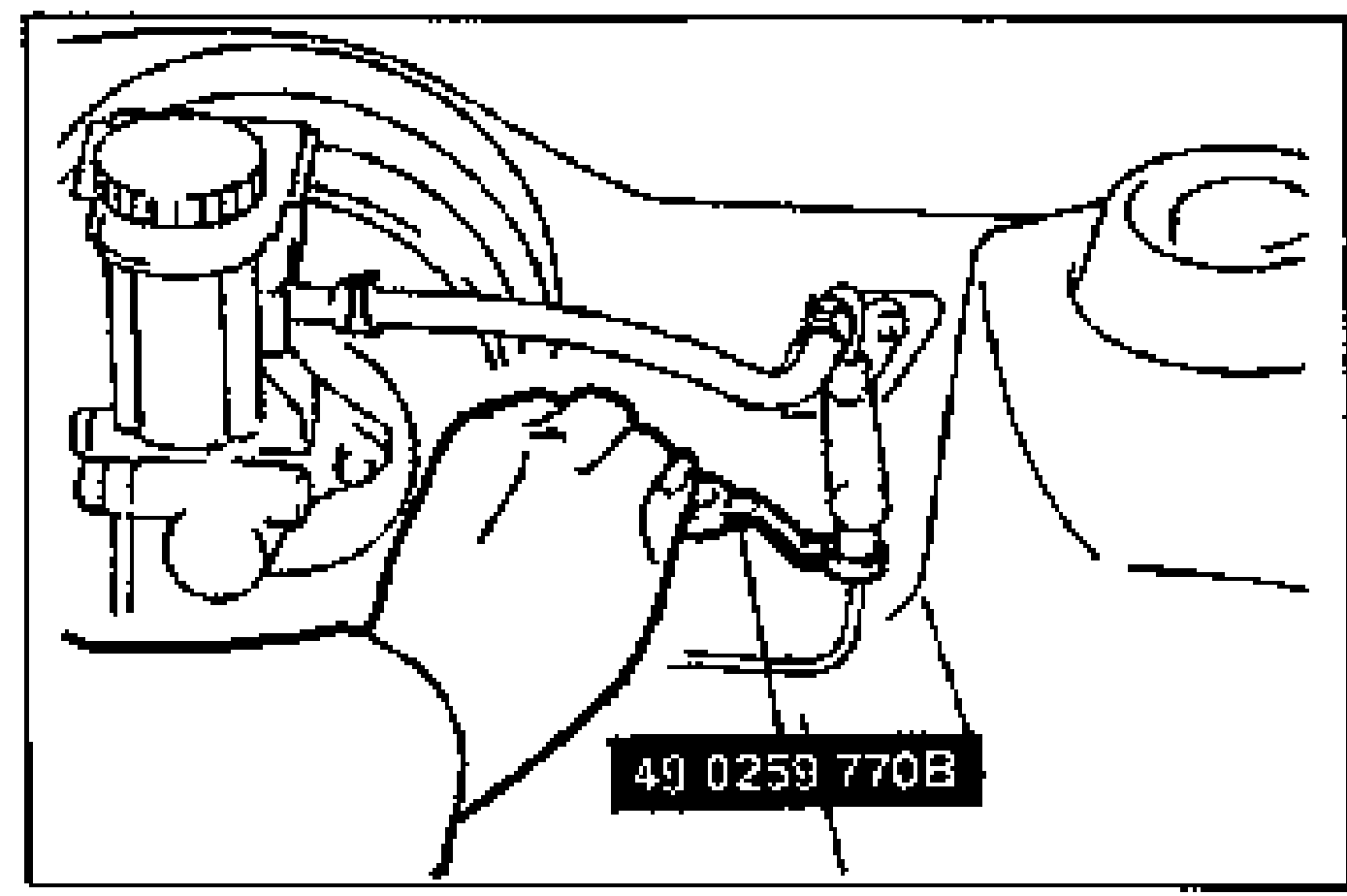 A hand using the SST flare-nut wrench (49 0259 770B) to disconnect the clutch pipe at the master cylinder near the fluid reservoir.
