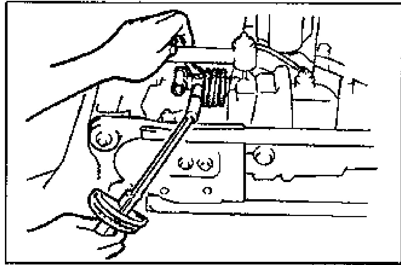 Installing the boot and joint to the change rod assembly with the drain hole facing downward.