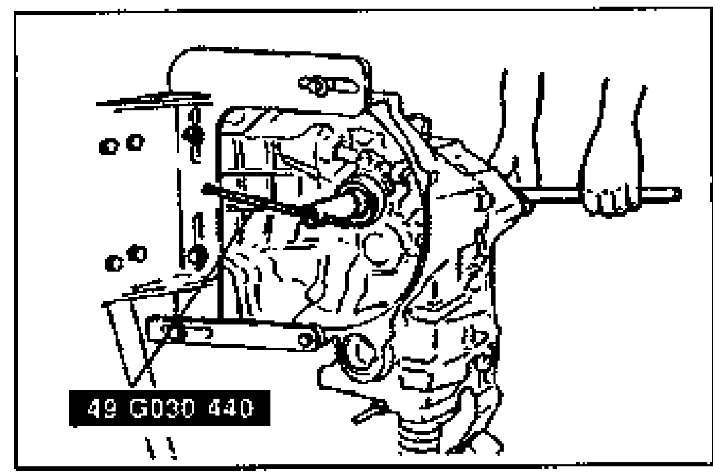 Illustration of locking the primary shaft using the SST (49 G030 440) while a wrench loosens the locknut. Shows the transaxle case end with the SST clamped over the gear shaft.