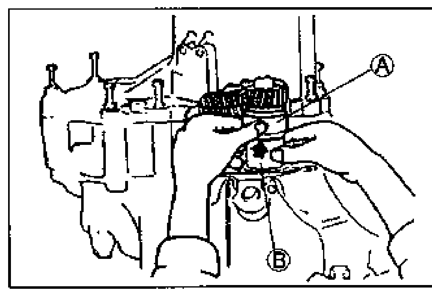 Manually expanding the selector by hand until it no longer turns. Balloon callouts A and B mark the two halves/parts of the selector being turned.