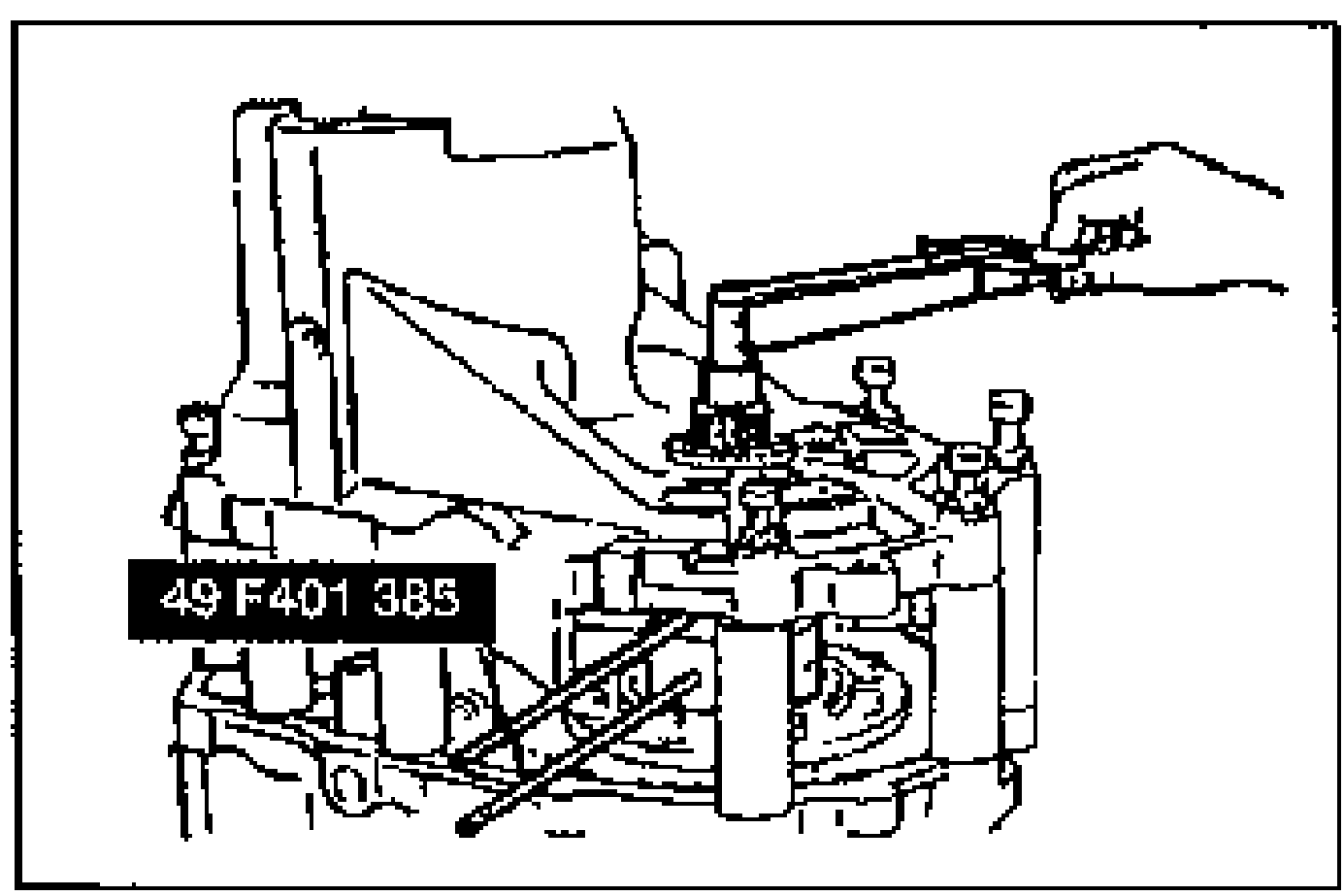 Turning the SST selector with a torque wrench to obtain the specified preload. SST 49 F401 385 (bar) labeled.