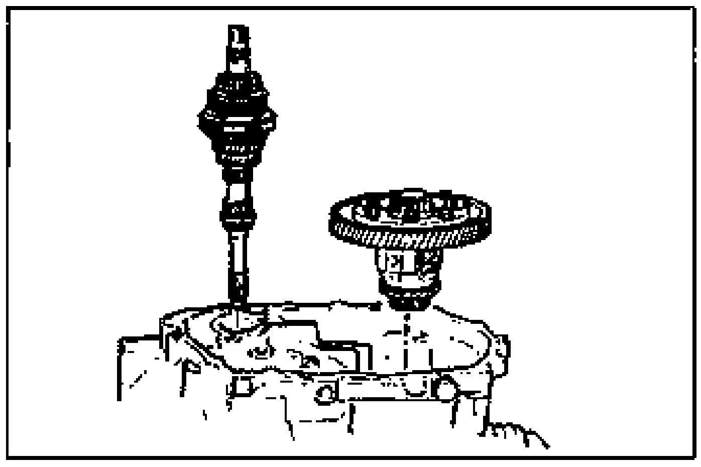 Setting the primary shaft gear assembly and differential into the clutch housing to verify bearing preload.