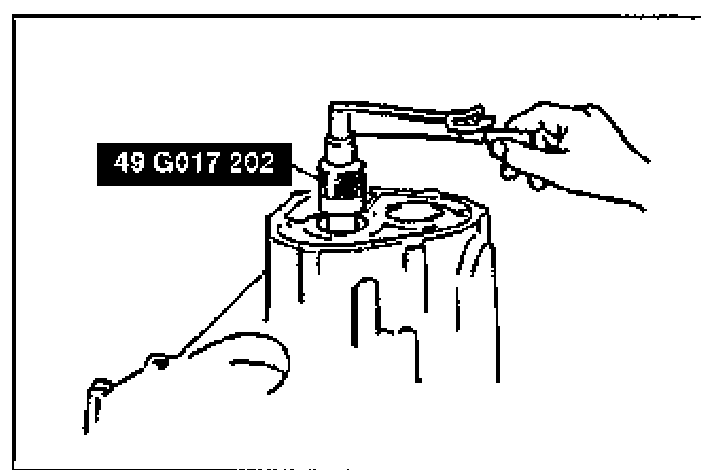 Connecting a torque wrench to the SST installed on the secondary shaft gear assembly to measure the preload. Tool 49 G017 202 labeled.
