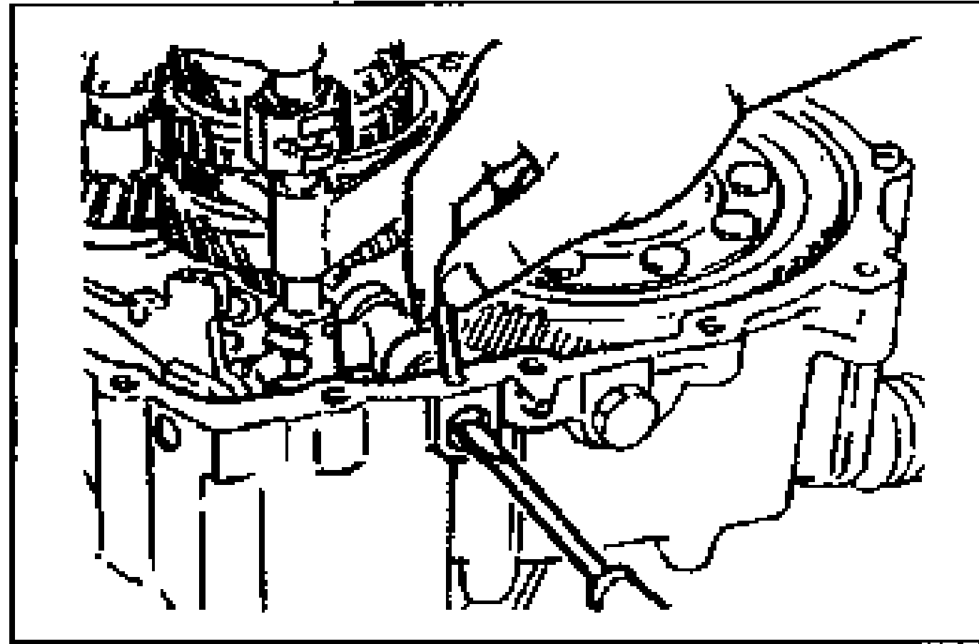 Photo of the crank lever assembly fitted between the change arm and control end, with the crank lever shaft connected and pin holes aligned to the clutch housing.