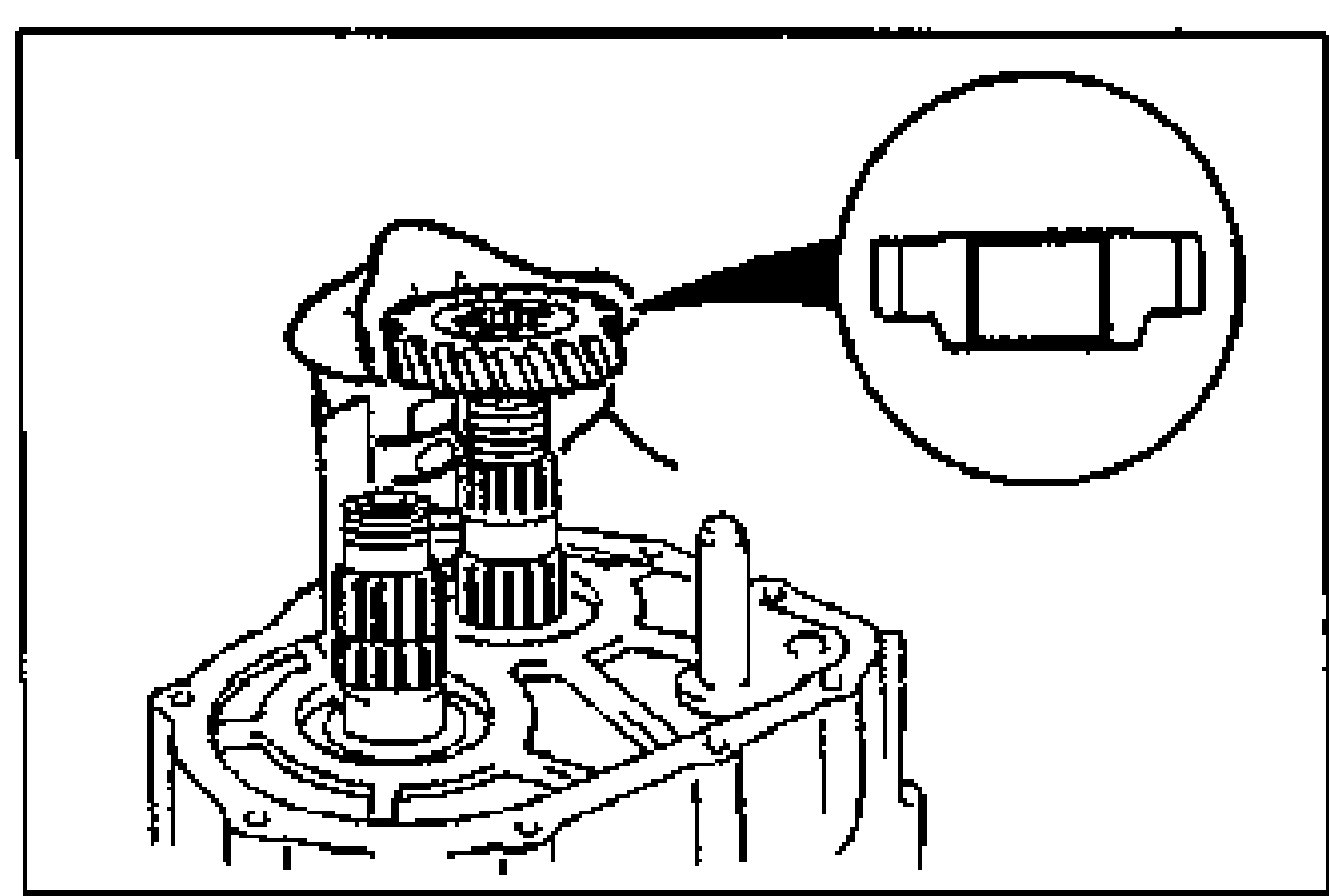 Photo of the secondary 5th gear being installed onto the shaft; a circular inset at upper-right shows the correct orientation of the gear (boss/chamfer facing) as a cross-section sketch.