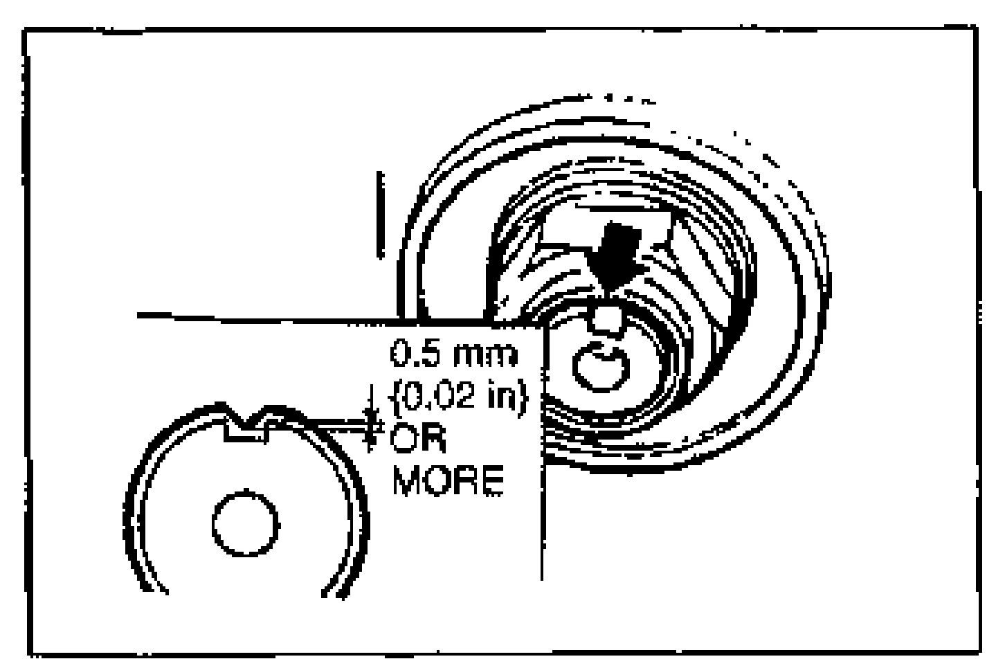 Hand using a wrench/tool on the steering knuckle and tie-rod end assembly, illustrating positioning of the tie-rod end and dust boot over the knuckle hole during installation.