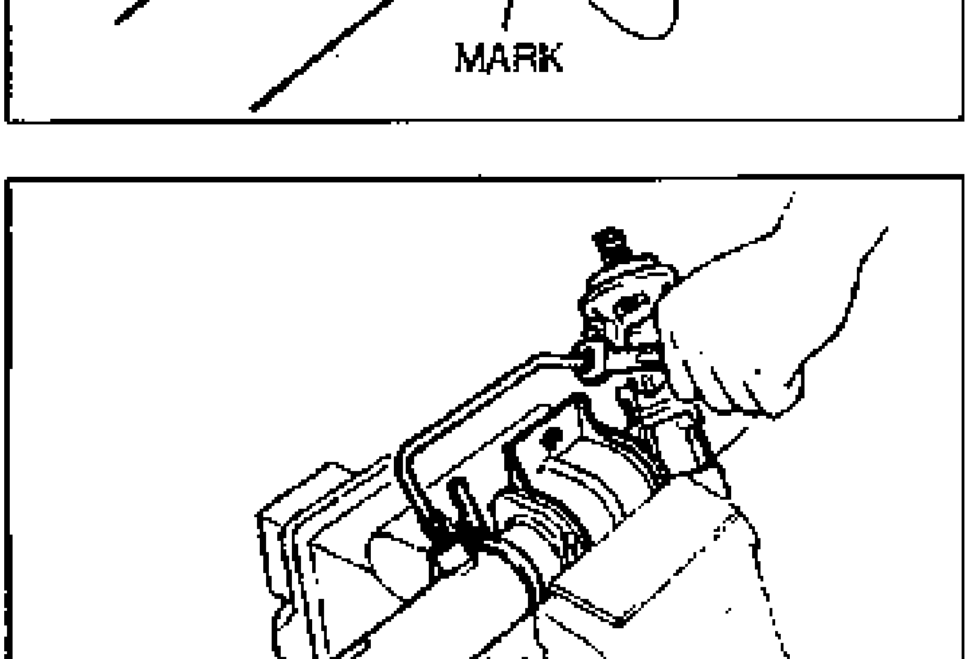 Gear and linkage secured in a vise; hand removing the oil pipe.