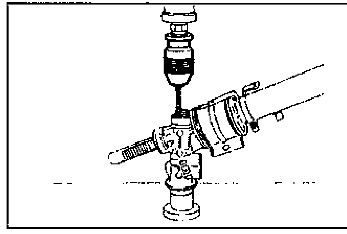 Using a drill to make a recessed area at the punch-crimped part of the threaded housing cover.