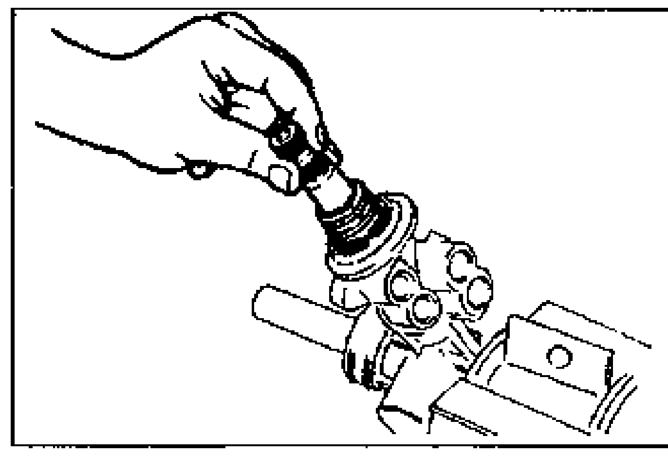 Line drawing of installing the pinion shaft assembly into the housing held in a vise.