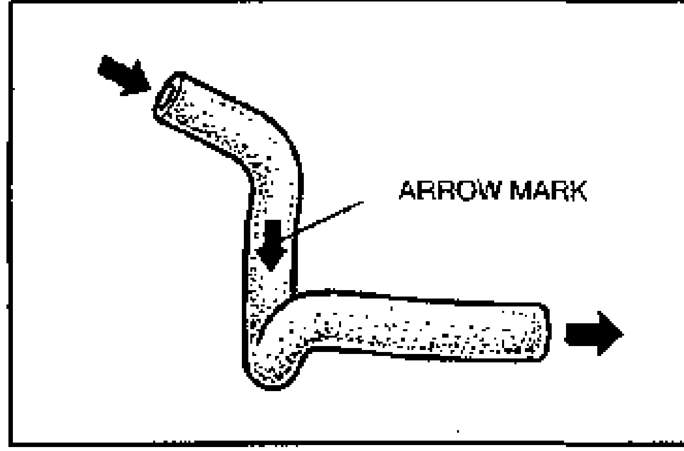 Illustration of the vacuum hose with arrows showing the airflow direction test. An ARROW MARK label indicates the molded directional mark on the hose, with arrows pointing toward the engine side.
