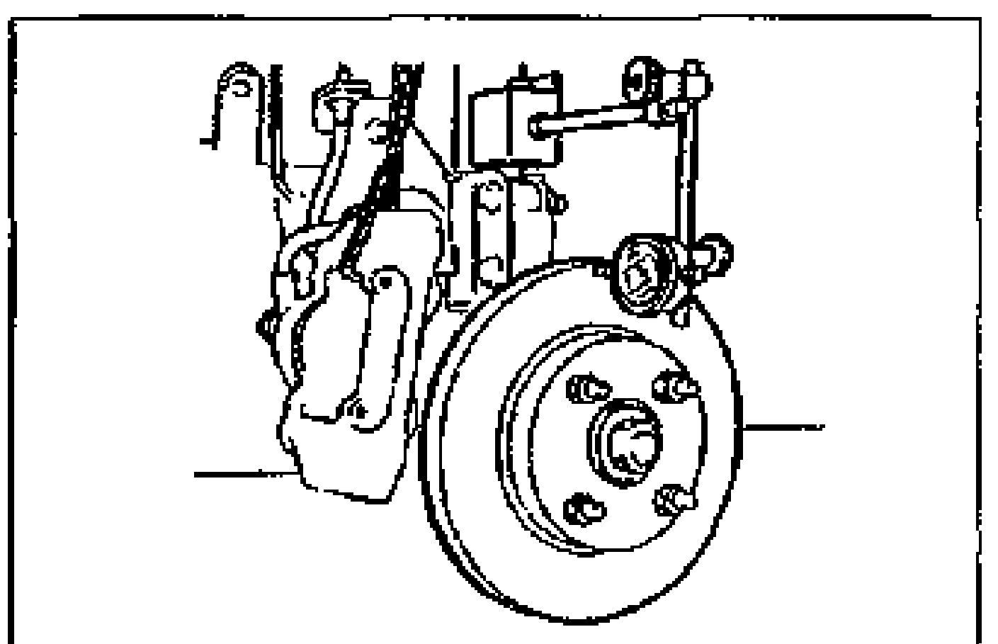 A dial indicator set up against the outer edge of the disc plate (rotor) to measure runout, with the hub and wheel studs visible.
