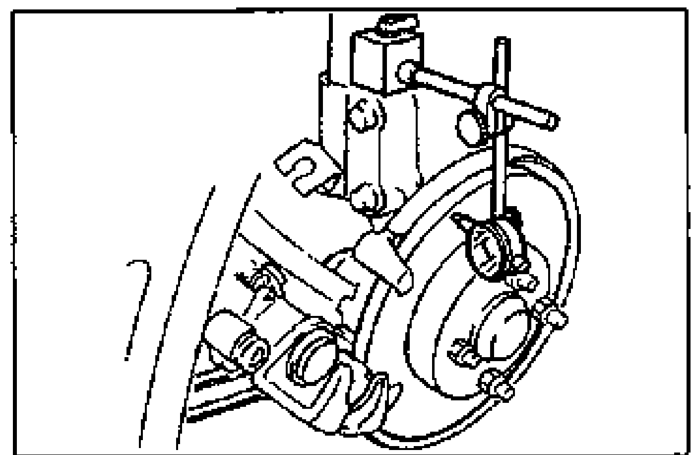 A dial indicator mounted to measure runout at the outer edge of the rear disc plate (rotor) on the vehicle.