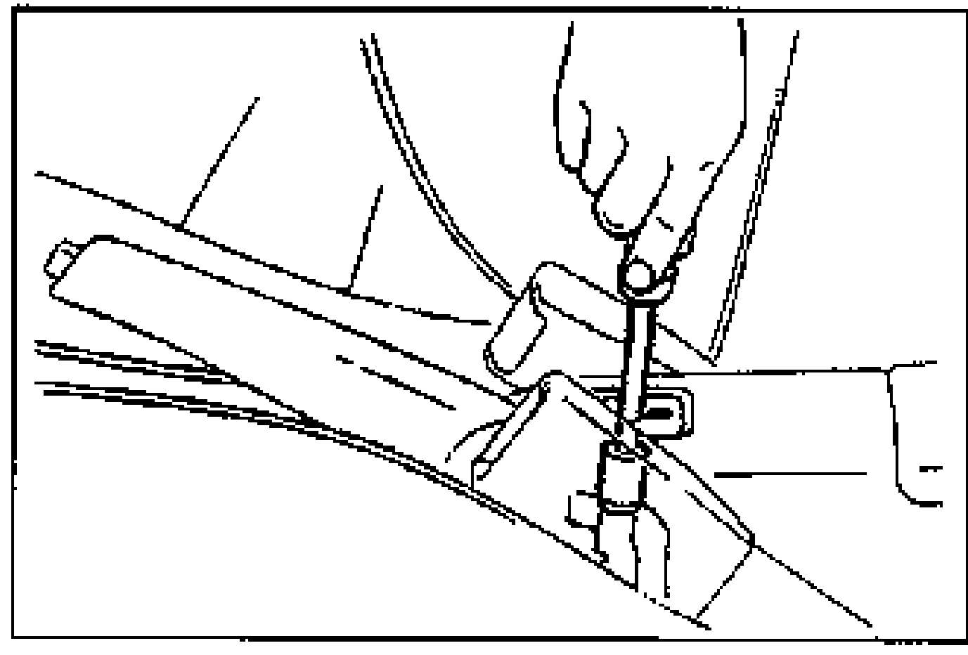 Line illustration of a hand turning the adjusting nut at the front of the parking cable with a wrench, near the parking brake lever console.