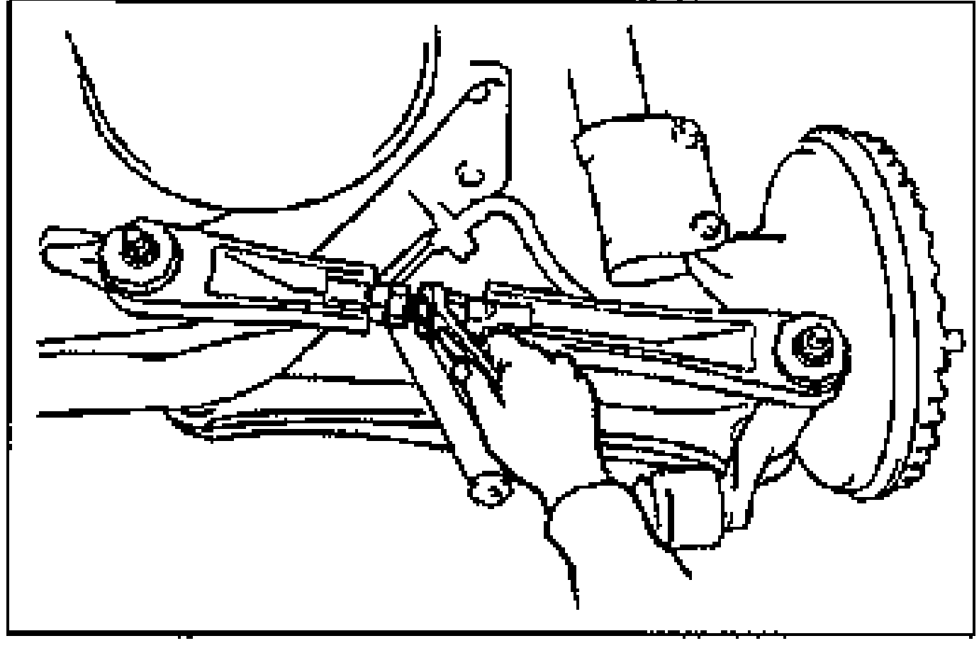 Under-vehicle view of the rear suspension showing a wrench turning the lateral link adjustment link to adjust rear total toe-in.