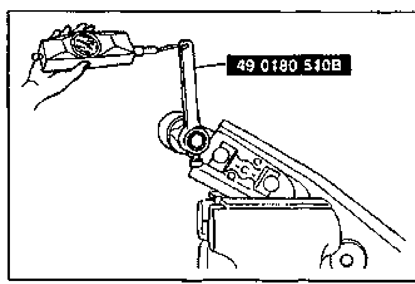 Hand holding the lower arm with SST 49 0180 510B attached to the ball stud, measuring rotation torque with a pull scale.