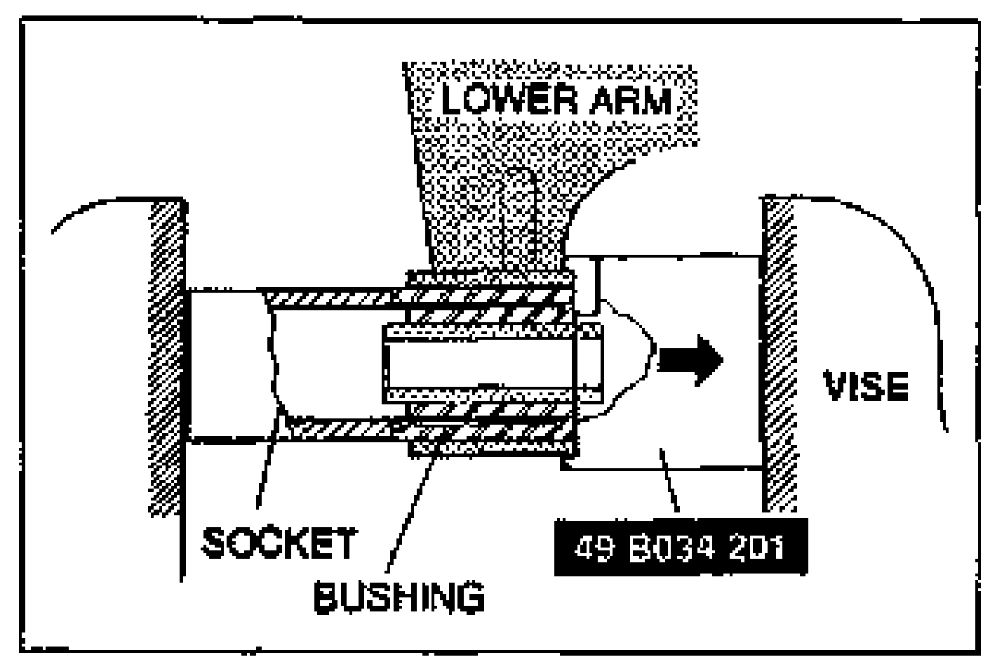 Hand using a chisel to carefully remove the ball joint dust boot, with the ball joint secured in a vise.